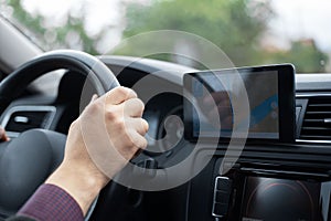 Close-up of modern GPS navigation system for car.