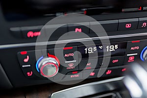 Close-up of modern luxury car climate control panel