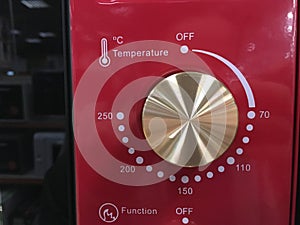 Close up of modern microwave control panel, knob and modes