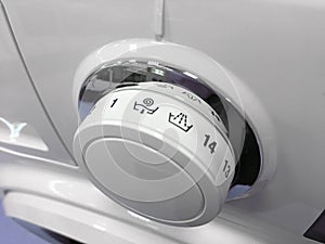 Close up of modern microwave control panel, knob and modes