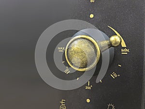 Close up of modern microwave control panel, knob and modes