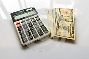 Close-up Money and Calculator, American Dollar Banknotes