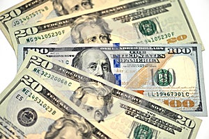 A close-up of money, 20 dollars and 100 dollars