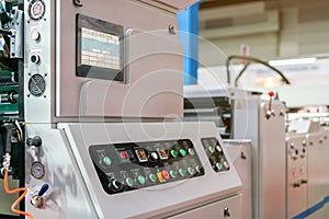 Close up monitor and many push button of control panel for modern and high technology of automatic publication or printing machine