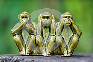 Close up Monkey statues made of ceramic in concept of see no evil, hear no evil and speak no evil
