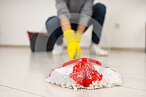 Close-Up of Mopping in White Room