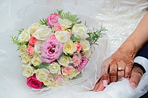 Close up of moroccon couple`s hands at a wedding, photo