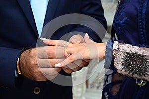 Close up of moroccon couple`s hands at a wedding, concept of marriage, photo