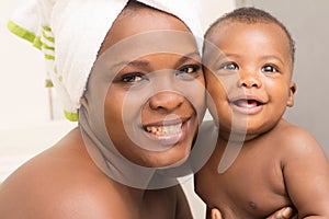 Close up of mother and happy son after bath