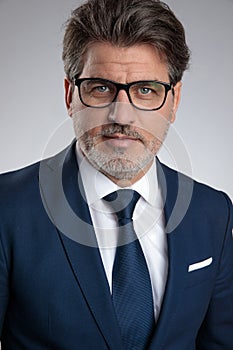 Close up of a motivated businessman wearing glasses