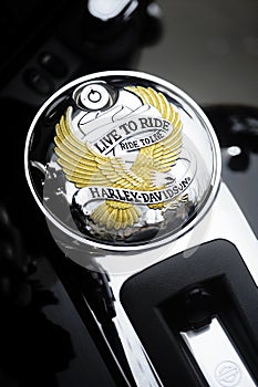 Close up of a motorcycle fuel tank cap with the Harley Davidson