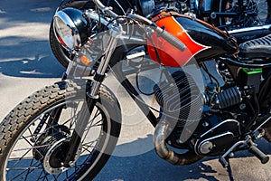 Close-up of motorcycle parked on city street