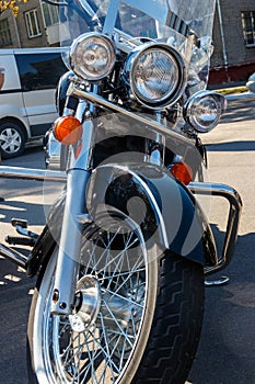 Close-up of motorcycle parked on city street