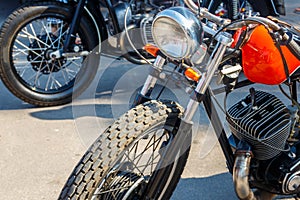 Close-up of motorcycle parked on city street