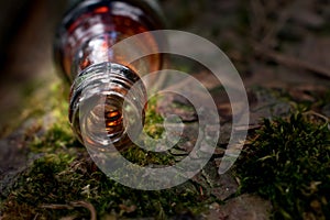 Mouth of a small bottle with red stains photo