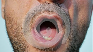 Close up of mouth talking fastly, talkative man