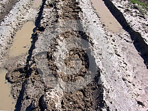 Close-up of muddy road.