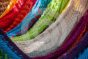 Close-up of multi-colored hammocks