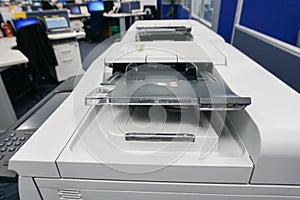 Close up multifunction printer tray in office