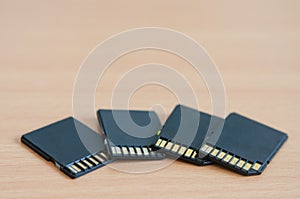 Close-up of multiple  old  sdhc  memory cards and adapters