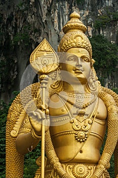 Close up of the Murugan Statue (Tugu Dewa Murugga), a Hindu deity at Batu Caves, Selangor, Kuala Lumpur, Malaysia