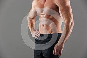 Close up of a muscular fit male bodybuilder torso