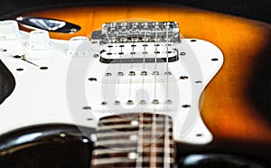 Close up of music guitar. Stringed electric musical instrument. Musical instrument for rock, blues, metal songs. Guitar