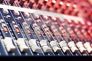 Close-up of music mixer in audio studio