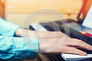 Close-up of a music performer`s hand playing the piano, man`s hand, classical music, keyboard, synthesizer, pianist