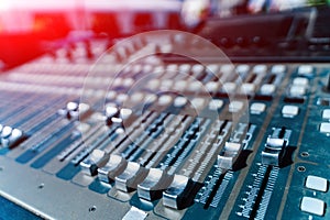 Close up of musical studio mixer. Electronic volume radio technologies.