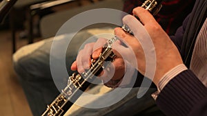 Close-up of musician playing on oboe