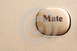 Close up of a mute button photo