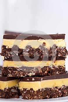 A close up of Nanaimo bars - a traditional Canadian dessert