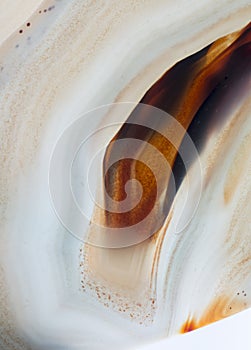 Close up of natural agate crystal surface, Agate crystal cross section. Abstract background texture