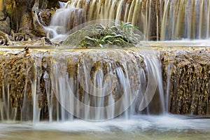 Close up natural deep forest waterfall