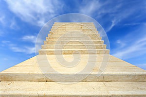 Close up natural stone Travertine staircase on blue sky