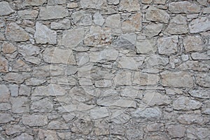 Stone wall texture background seamless in rustic style photo