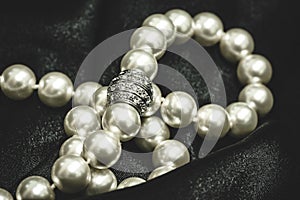 Close-up of a necklace of white pearls