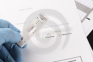 Close-up of negative result by rapid antigen test for SARS-CoV-2, COVID-19