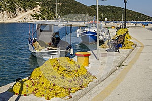 Dock nets and fishing boats in the port of frikes ithaka