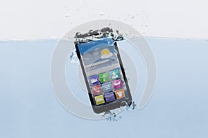 Mobile Phone Submerged In Water photo