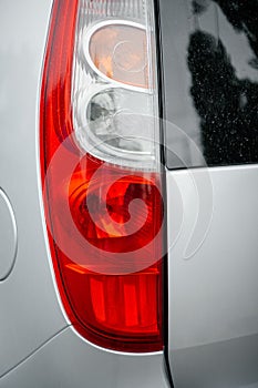 Close Up Of A New Car Taillight . Vertical shot