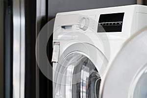 Close up of new dryer machine in household appliances store