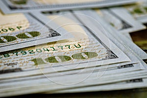 Hundred dollar bills pile