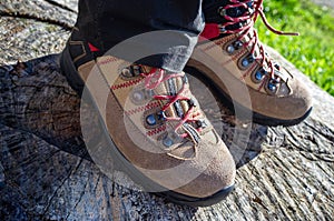 Close-up of new mountain boots on a child's feet