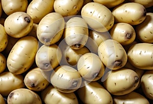 Close up of new potatoes outside a greengrocers photo