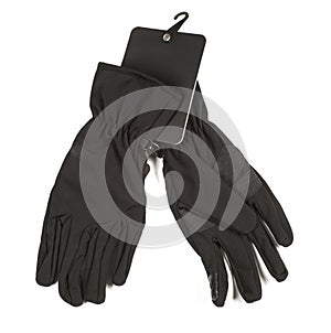 Close-up of new ski black gloves isolated on white background