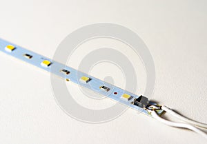 Close-up of new technology     led light strip   on white background