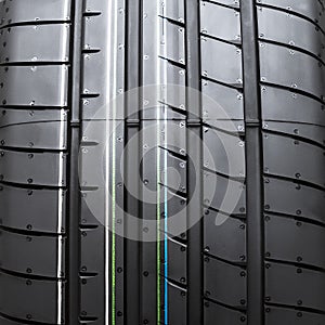 Close up new tyre isolated on white background