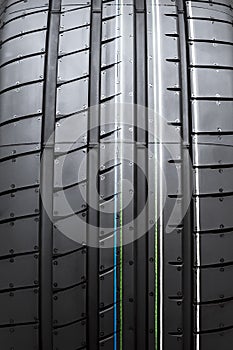 Close up new tyre isolated on white background